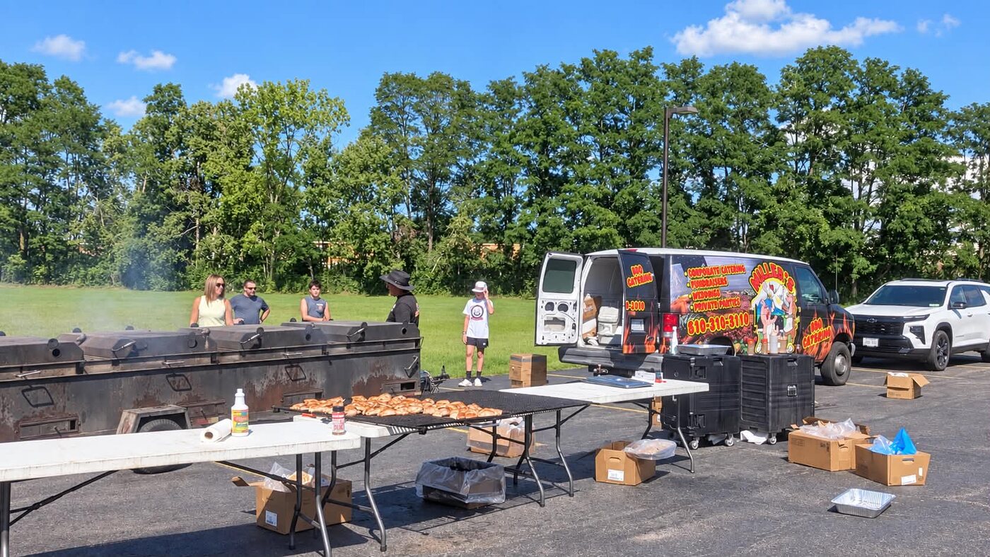 Grills and the Miller's BBQ catering van set up for the chicken BBQ fundraiser