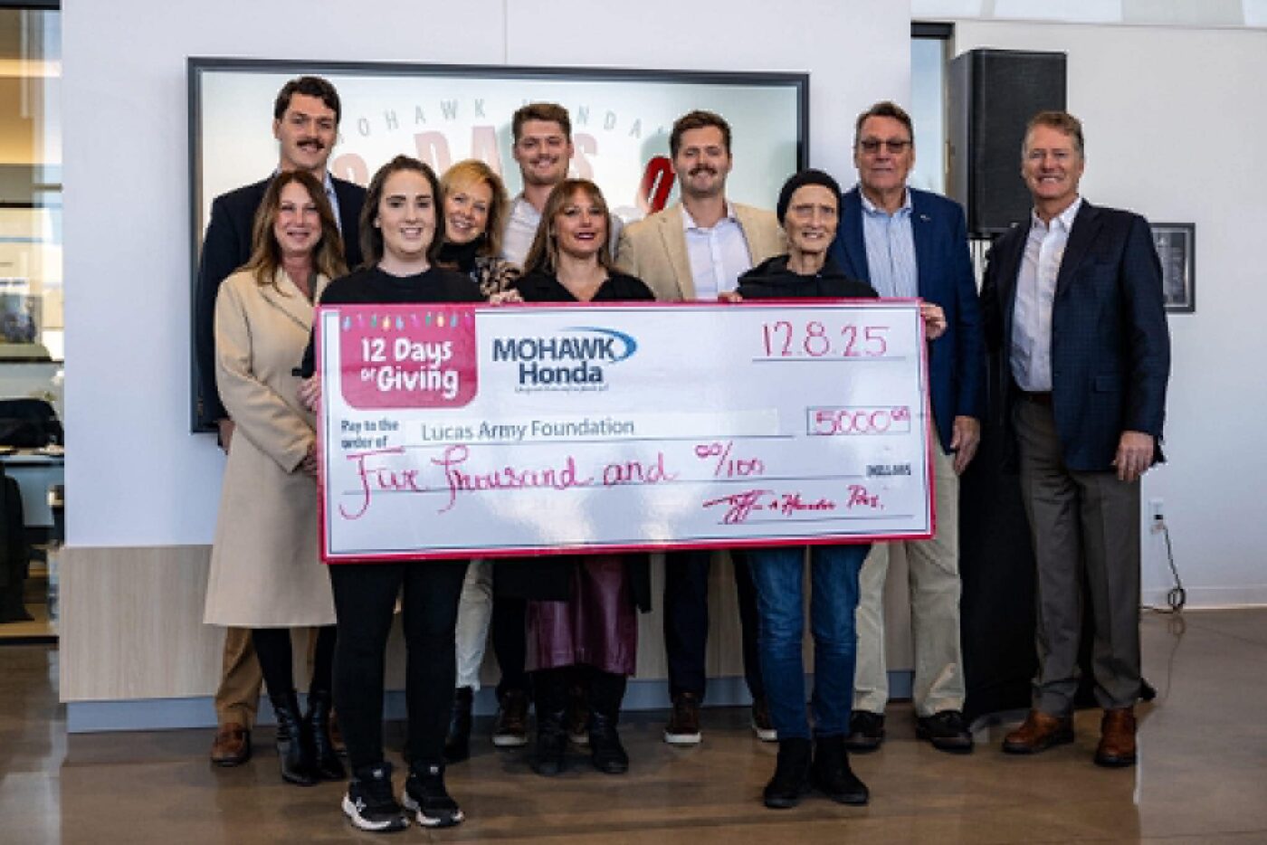 Mohawk Honda presenting a $5,000 check to Lucas' Army Foundation